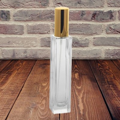 Frasco de perfume transparente con pulverizador dorado 50 ml