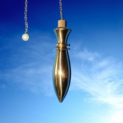 Karnak pendulum made of brass, gold plated