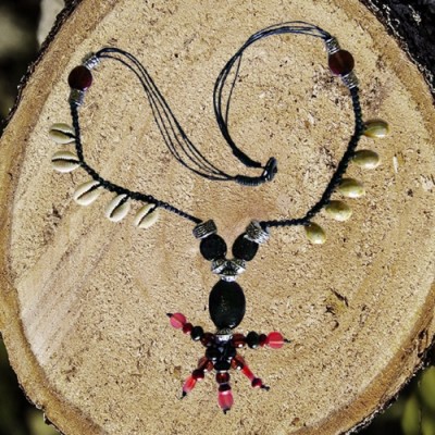 Voodoo necklace with cowrie shells