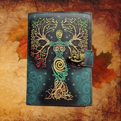 Book of Shadows Goddess in a tree intertwined with brass fittings