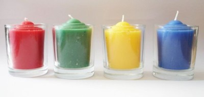 Votive candle through colored, blue, in glass