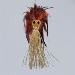 Voodoo head with raffia beard and feathers